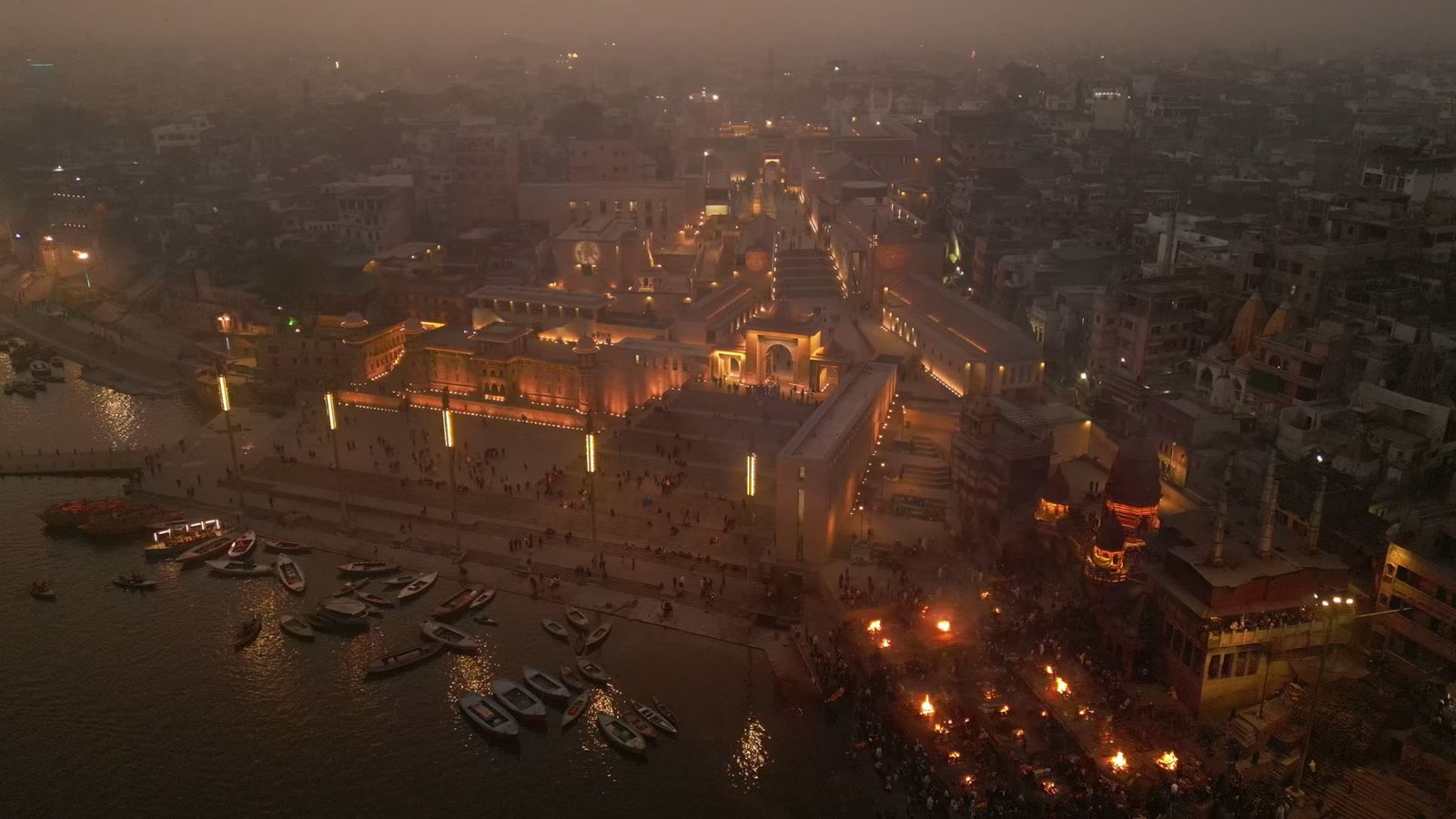 The ghats of Kashi at dusk, seen from above the Ganges